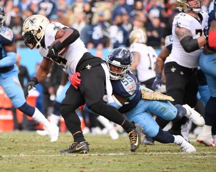 Tennessee Titans linebacker Jayon Brown (55) tackles New Orleans Saints running back Mark Ingram II (14). Mandatory Credit: Steve Roberts-USA TODAY